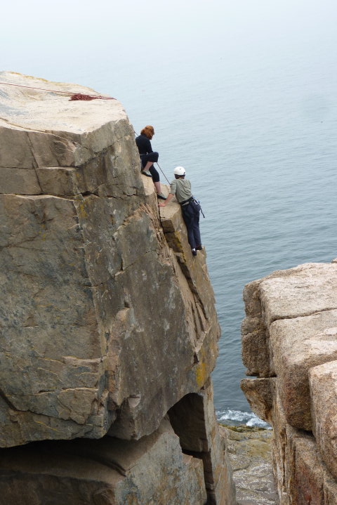 You'll see many similar iconic shots of climbers on this exact climb at Otter Cliffs. Most guiding services will take you here and the top roping is well established with metal rings and staples. It's still a good idea to know how to build your own anchors in the many cracks here, though. Beware of the tide, and do not descend near the waves to retrieve lost forgotten gear. Let it go man, just let it go. [Credit: Charles Fischer]