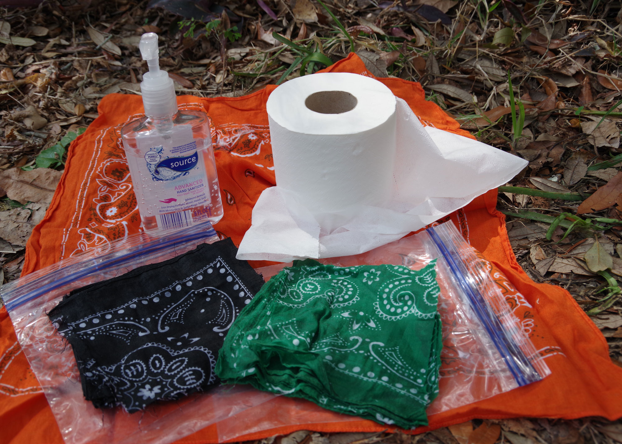 A bandana, biodegradable toilet paper, reusable bathroom wipes, and hand sanitizer will keep you clean and healthy on the trail.  | Credit: Karen Miller